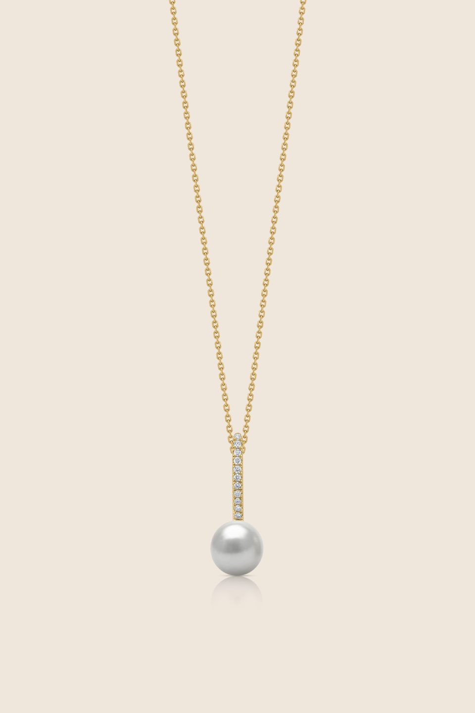 lavita yellow gold pentant with central pearl and diamond swirl