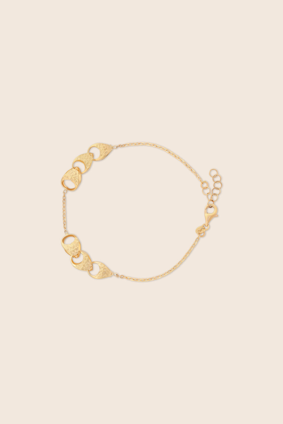 Affinity bracelet in yellow gold with six interlinked motives