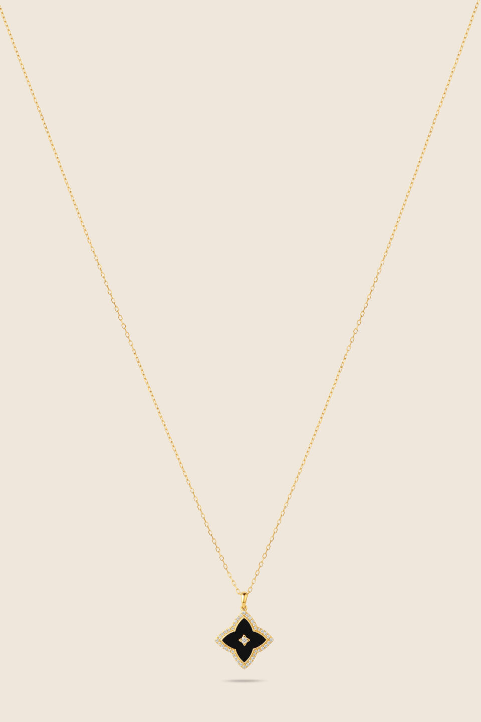 Amara yellow gold diamond necklace with black onyx
