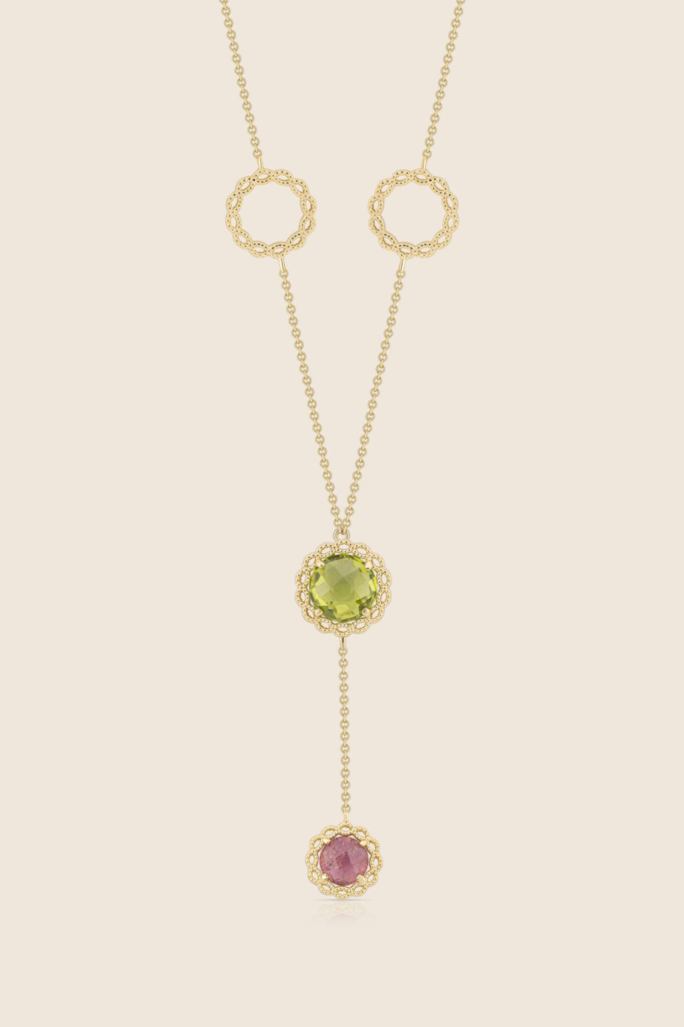 Chiara yellow gold two motive pendant with peridot and amethyst