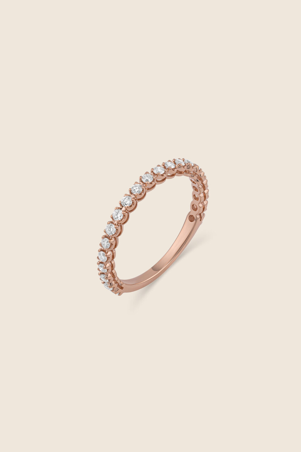 Classic rose gold diamond ring with four prong basket setting