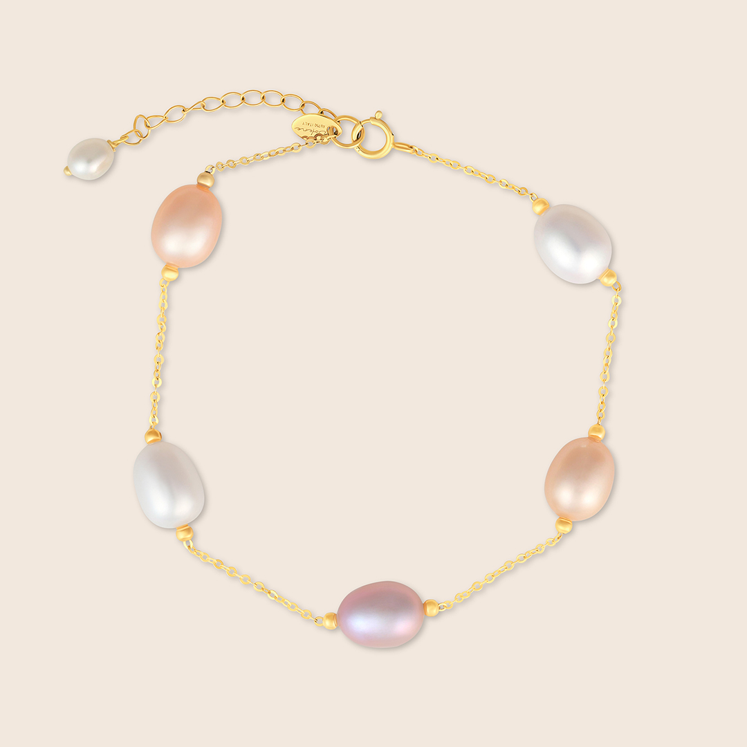 FXI28HJDU5_1 Lavita yellow gold oval coloured pearl bracelet - Image 1