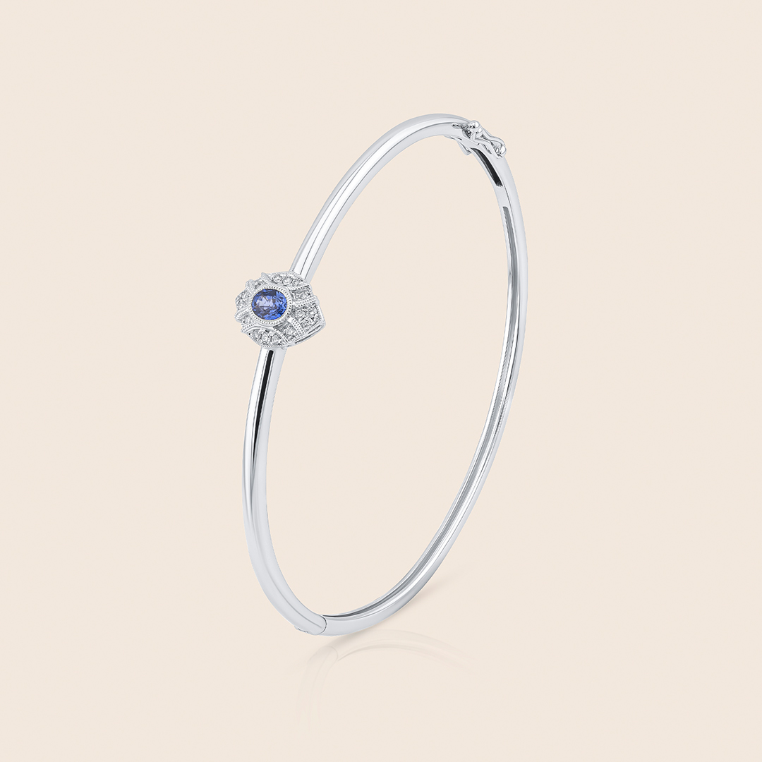 03 Revival white gold diamond bangle with blue sapphire - Image 1