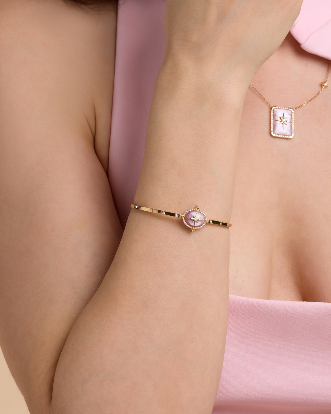 ADBG000305-image-39-Untitled-design-12 Flare rose gold diamond oval bangle with MOP - Image 1
