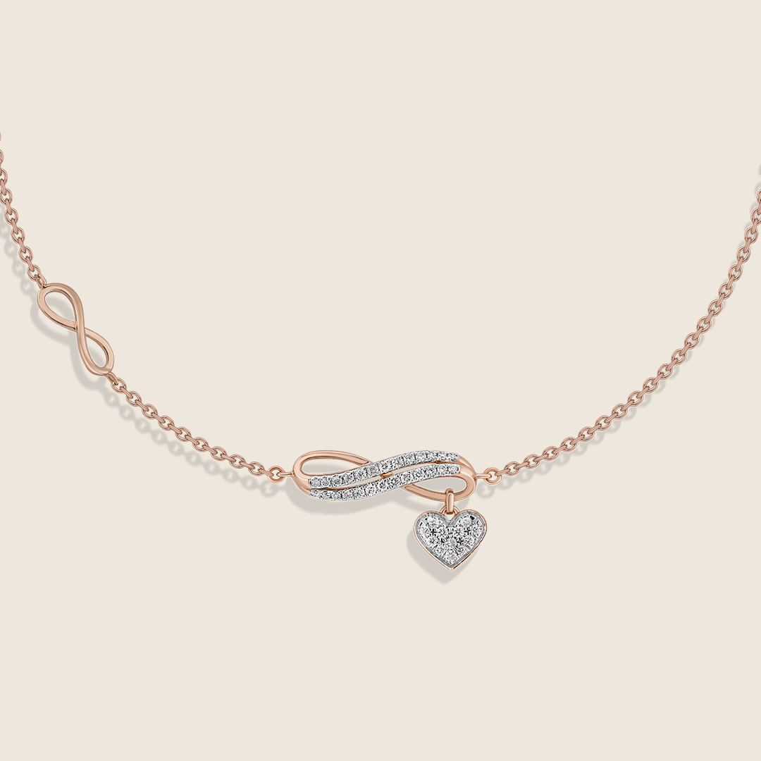 ADBR000658-image-96-11J185312601-2 Esme rose gold diamond infiniti bracelet with heart dangle - Image 1