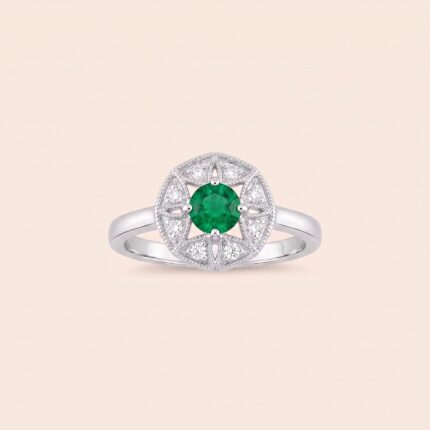 Revival white gold diamond ring with emerald